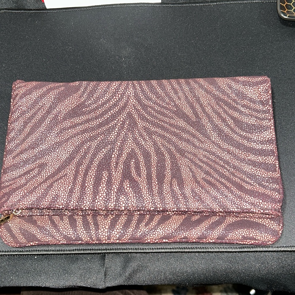 Diane Von Furstenberg Animal Print Clutch
“Philomena”